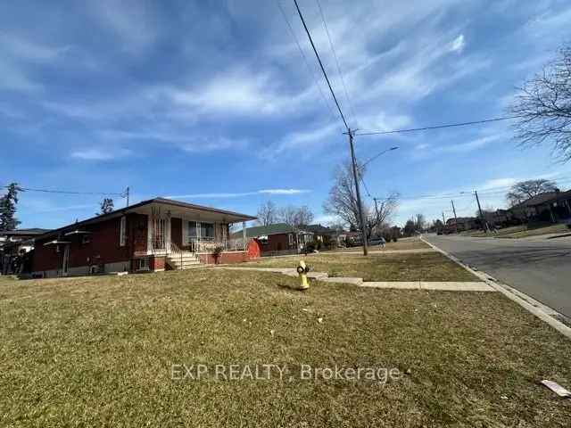 Large Corner Lot with Cozy Brick Bungalow - Investment Opportunity