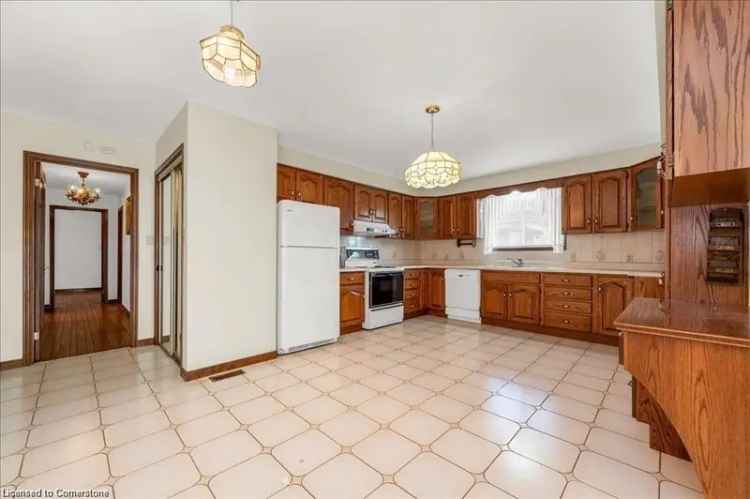 Spacious Raised Bungalow with Finished Basement and 2 Kitchens