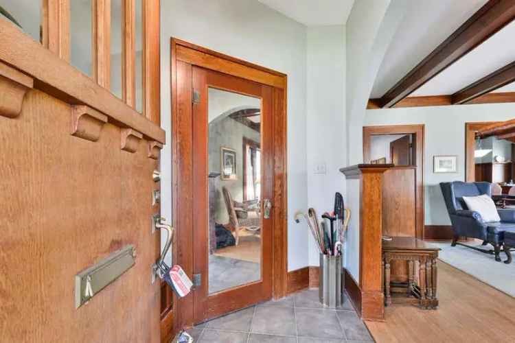 Elbow Park Gem: 1.5 Storey Home with Sunroom and Large Lot