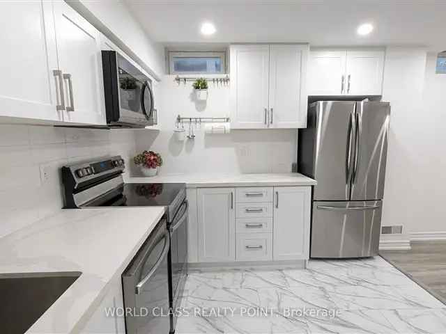 Bright 2 Bedroom Basement Apartment Modern Kitchen Quartz Countertops