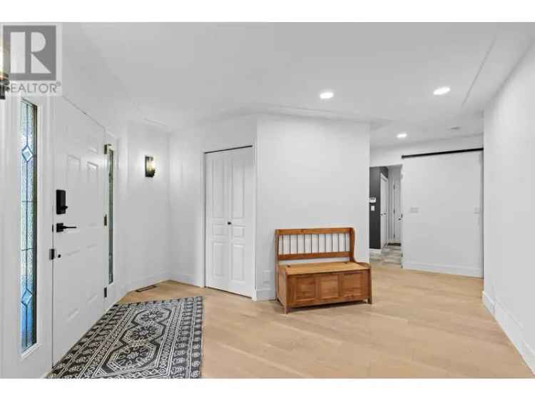 Lower Mission 4 Bedroom Home with Creekside Backyard