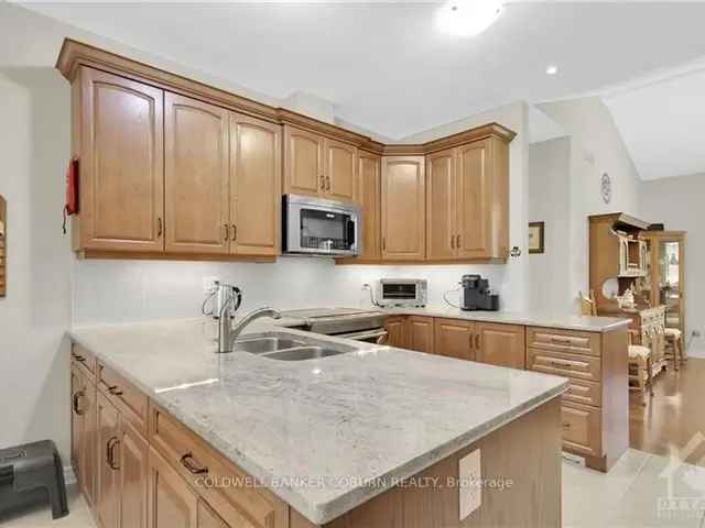 Detached Bungalow in Equinelle with Sunroom and Updated Kitchen