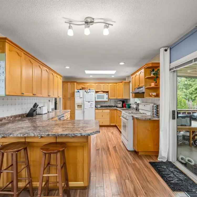 Spacious 3-Bedroom Comox Home with Workshop and Large Backyard