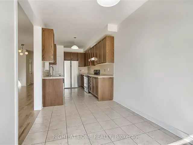 Spacious 4-Bedroom Townhome with Finished Basement and Extra Income Potential