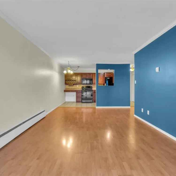 Buy Apartment in Vancouver with Updated Kitchen and Balcony