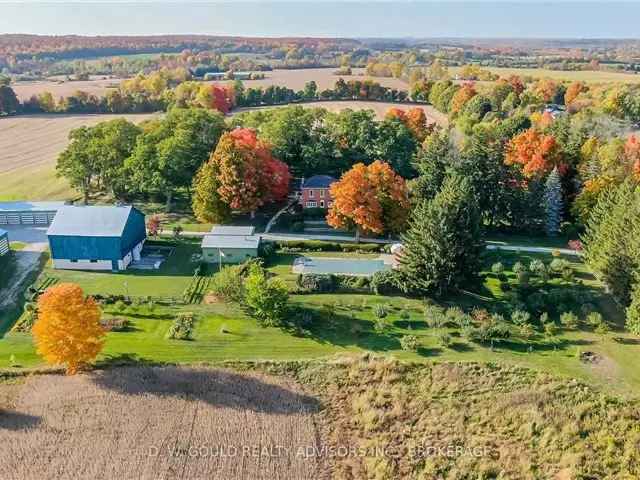 100 Acre Farm with Multiple Outbuildings and Two Homes