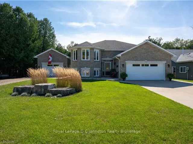 Spacious Family Home with Detached Garage and Greenspace Views