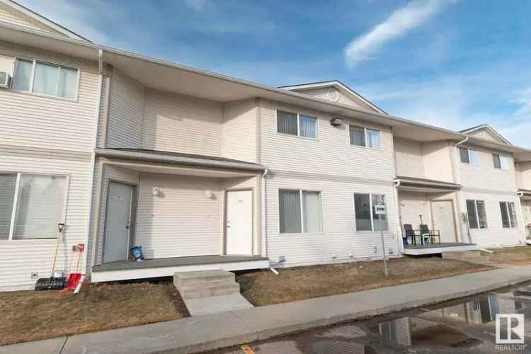 Buy townhouse in Spruce Grove with spacious living and low condo fees