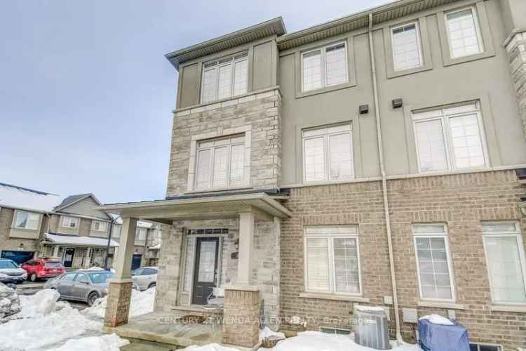 Buy townhouse in Waterdown Village with modern features and double garage