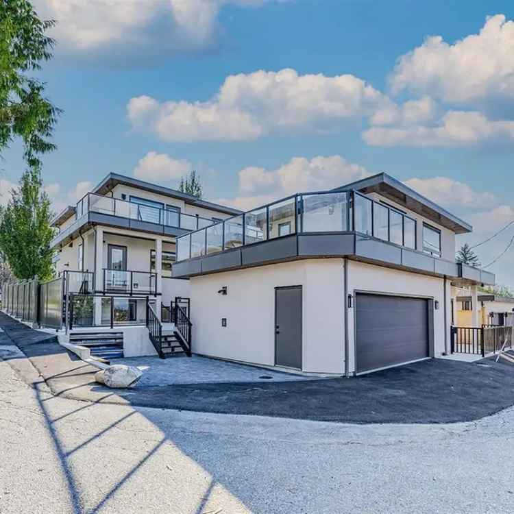 Luxury 5+2 Bedroom Home with Laneway House in Deer Lake