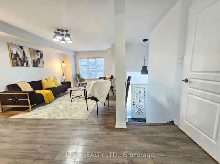 Freehold End Unit Townhouse with Spacious Backyard and Updates