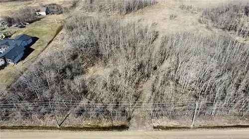 Buy Vacant Land in Transcona South Winnipeg with Mature Trees