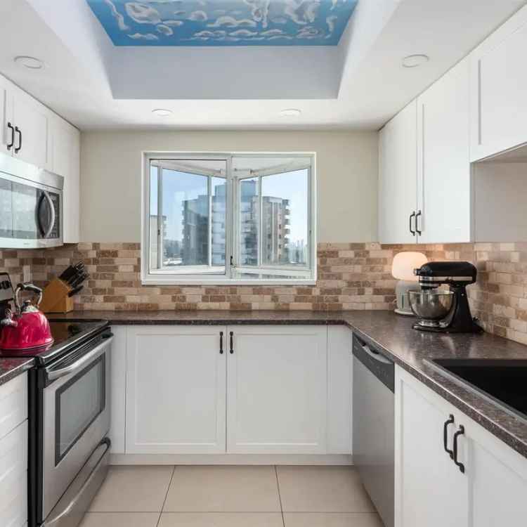 Spacious Lower Lonsdale Condo with Ocean Views