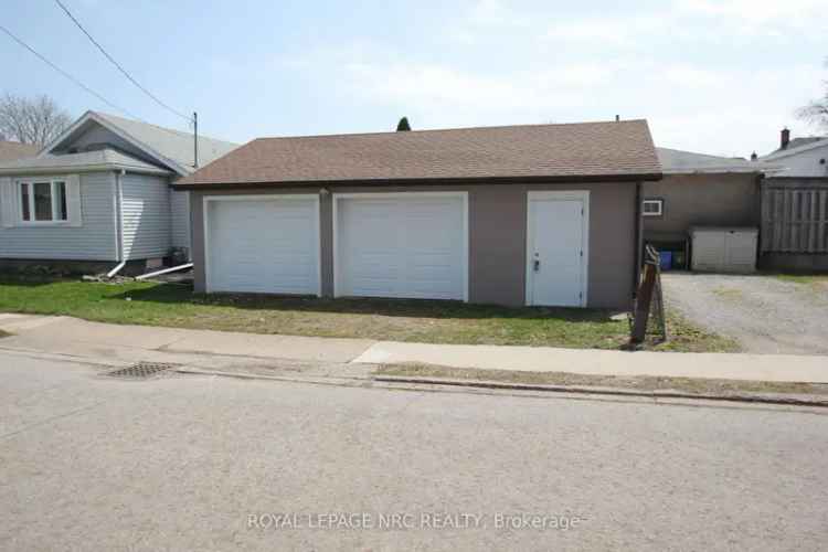 Fully Renovated 2400 Sq Ft Triplex with Detached Garage