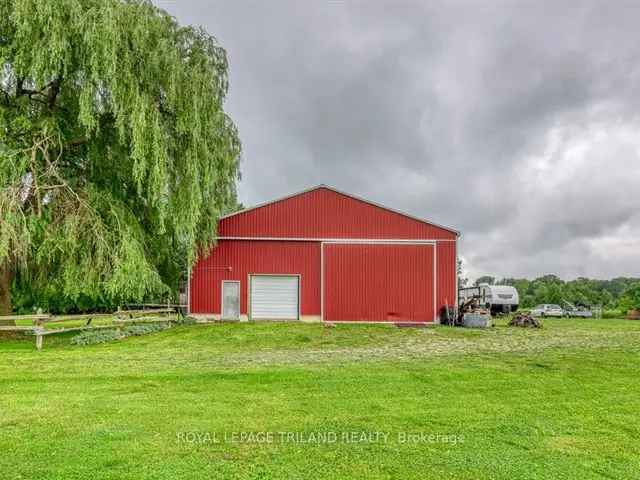 Stunning 8 Acre Brick Home with Pool, Shop & Finished Basement Suite