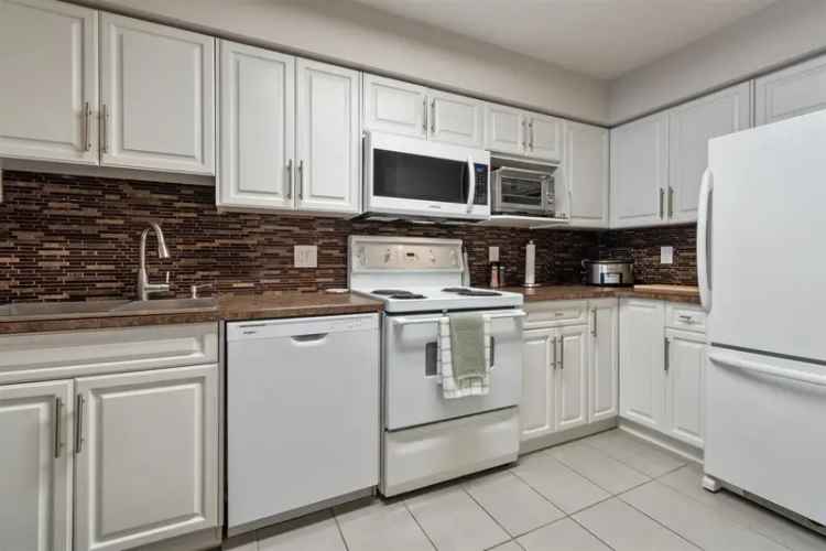 Surrey East Newton Condo for Sale Chelsea Gardens R2982953