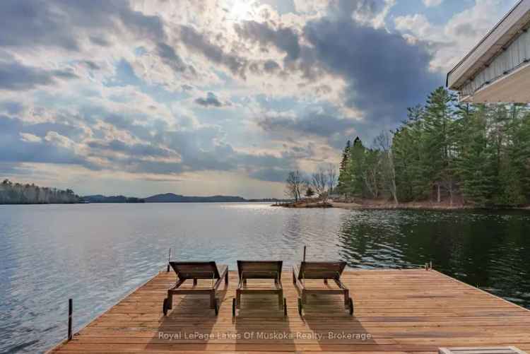Fairy Lakefront Home with Double Bay Boathouse and Stunning Sunsets