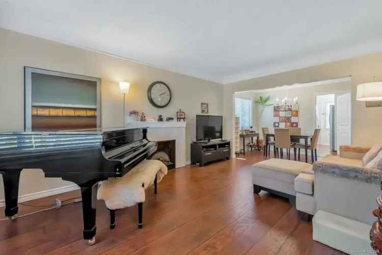 Buy Cozy Bungalow in Marpole with 4 Bedrooms and Future Redevelopment Potential