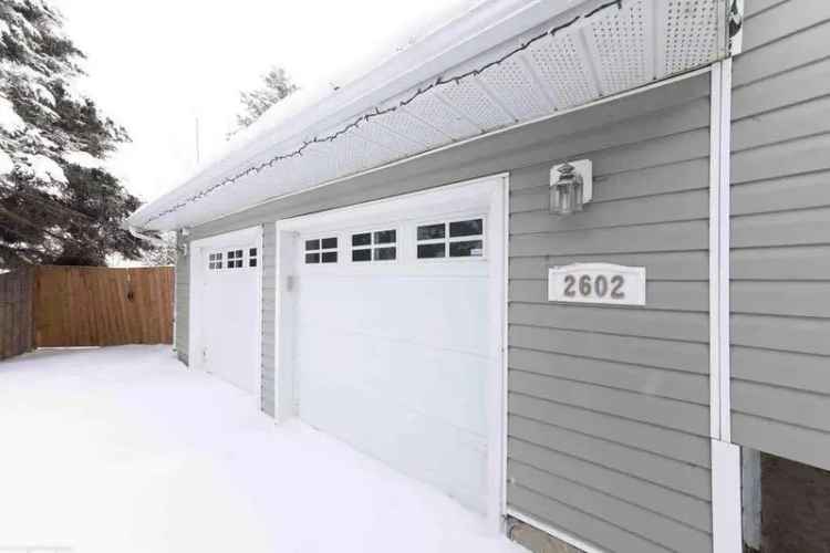 Renovated Bi-Level Home with Large Lot and Updated Features