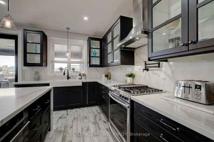 Executive home for sale in Mt Brydges with pool and spacious layout