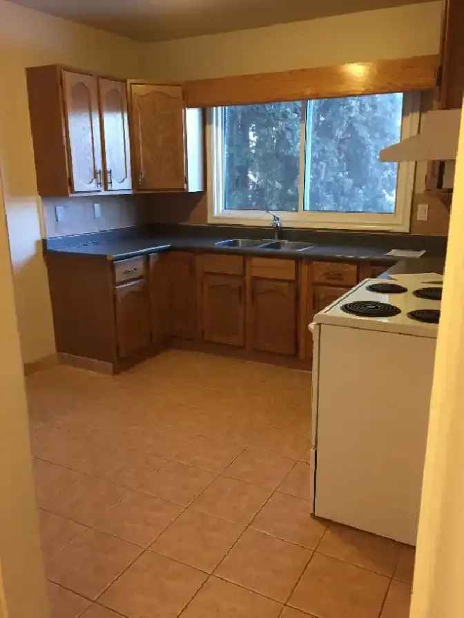 Rent Three Bedroom Main Floor Suite in North Side with Double Garage