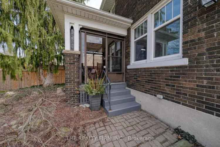 1930s Character Home  Updated Kitchen Family-Friendly Backyard