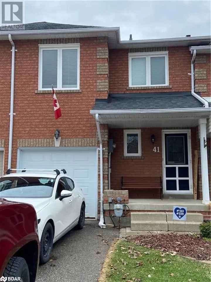 Spacious 3-Bedroom Townhouse with Finished Basement and Private Backyard