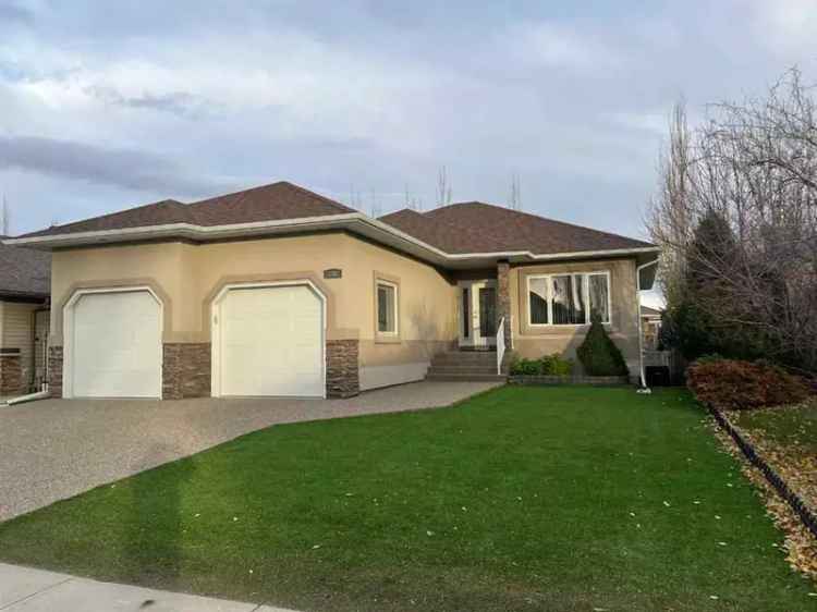 Buy Bungalow in Couleecreek Court with Large Basement and Heated Garage