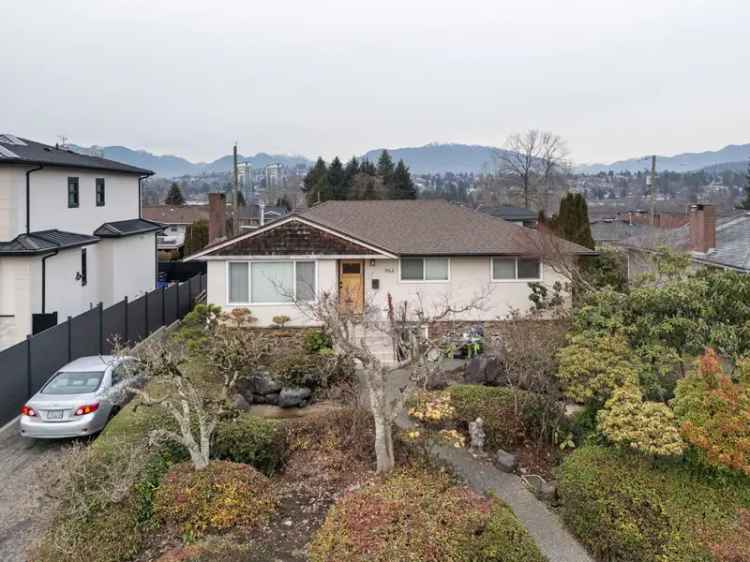 6 Bed 2 Bath Burnaby Home with Lane Access and Suite Potential