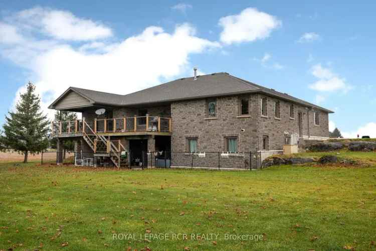 Buy Farm Property in Owen Sound with Spacious Bungalow and Outbuildings