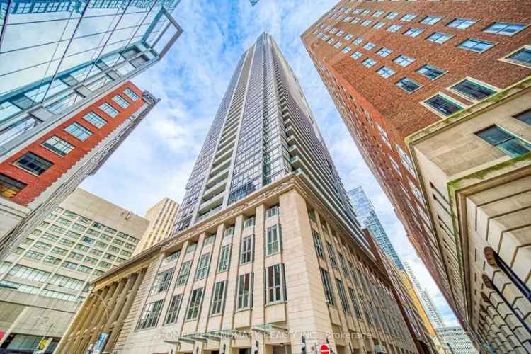 Buy Luxurious Condominium in Toronto Featuring City Views and Study Room