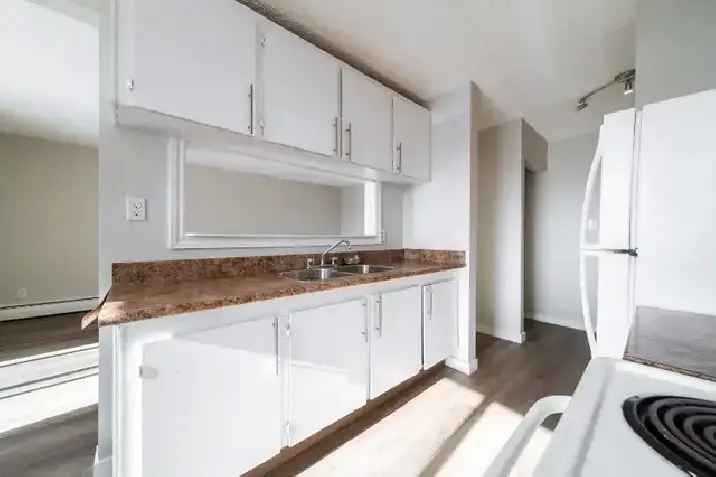 Rent Upgraded Apartment in Rundle Heights with Month Free Offer