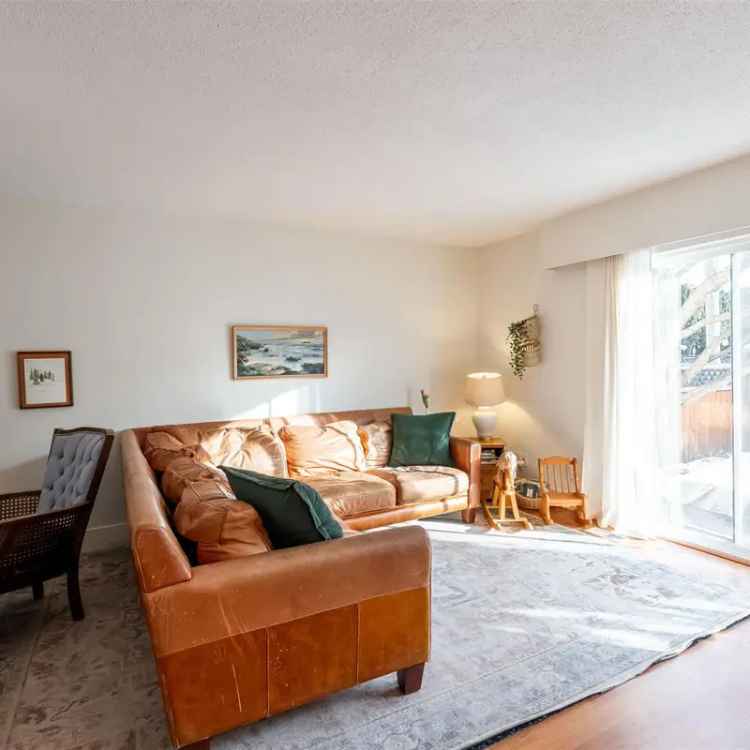 Buy townhouse in Central Abbotsford with modern updates and park access