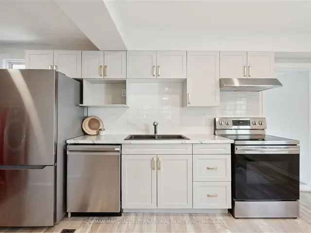 Contemporary Home with Sleek Kitchen and Finished Mudroom