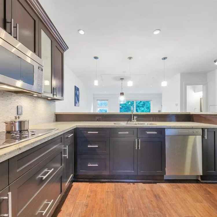 Point Grey 2-Level Condo for Sale - 2 Beds, Gourmet Kitchen