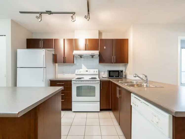 Coquitlam Centre 2 Bed 2 Bath Plus Den Home with Amazing Amenities