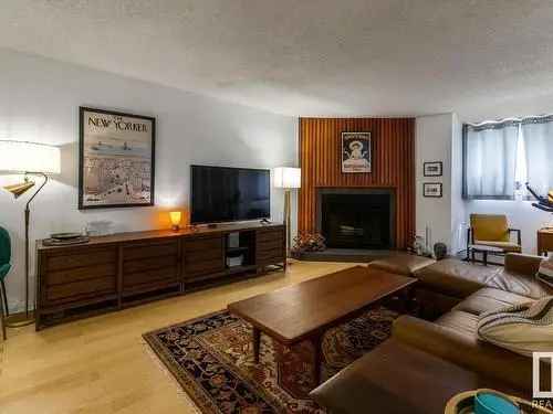 For Sale Charming Condo in Oliver Edmonton with Fireplace and Terrace