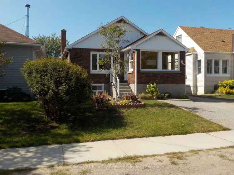 Buy Duplex in Mature Neighborhood with Renovated Units and Garage