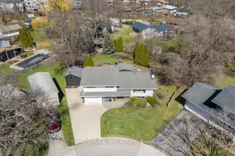 Sidesplit Home with Gourmet Kitchen and Backyard Oasis