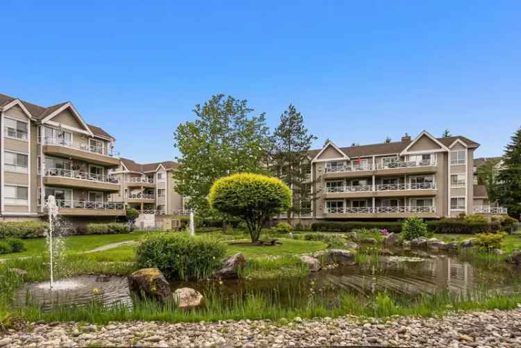 Langley City Condo: 2 Beds, 2 Baths, Balcony, Private Courtyard