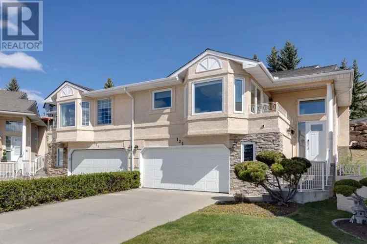 4 Bed 3 Bath Semi-Detached Bi-Level Home with Updated Kitchen and Garage