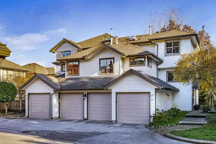 A $988,000.00 Townhouse with 4 bedrooms in Central Meadows, Pitt Meadows