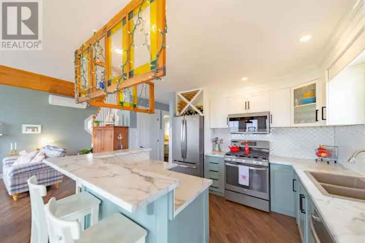 Beautiful Beachfront Home with Income Potential