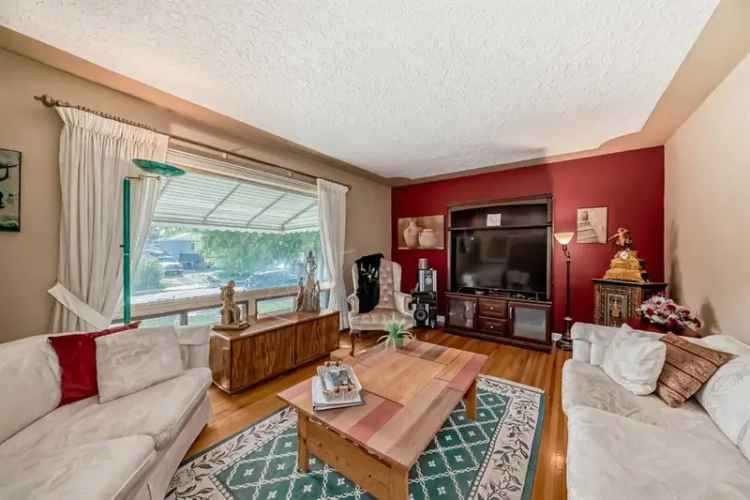 Buy House in Calgary with Redevelopment Potential and Big Yard