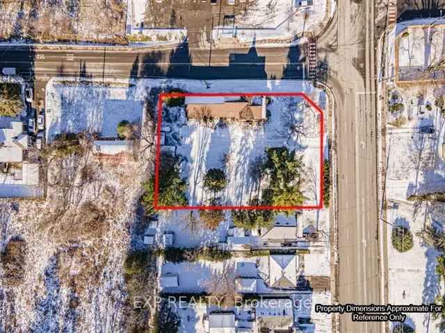 Half-Acre Corner Lot with Rented Duplex - Investment Opportunity