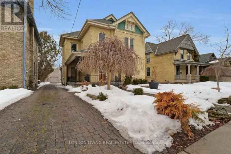 Buy Victorian Duplex in Old South with Spacious Rooms and Garage