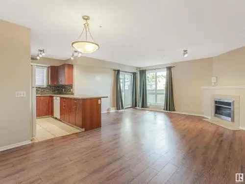 Buy Condo in Queen Alexandra with Two Bedrooms and Natural Light