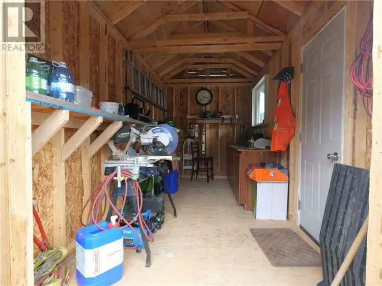 Affordable 2-Bedroom Mobile Home with New Roof and Sheds