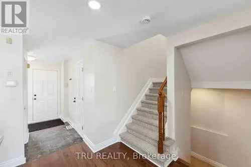 Buy Townhouse in Kanata Lakes with Walkout Basement and Garden Space