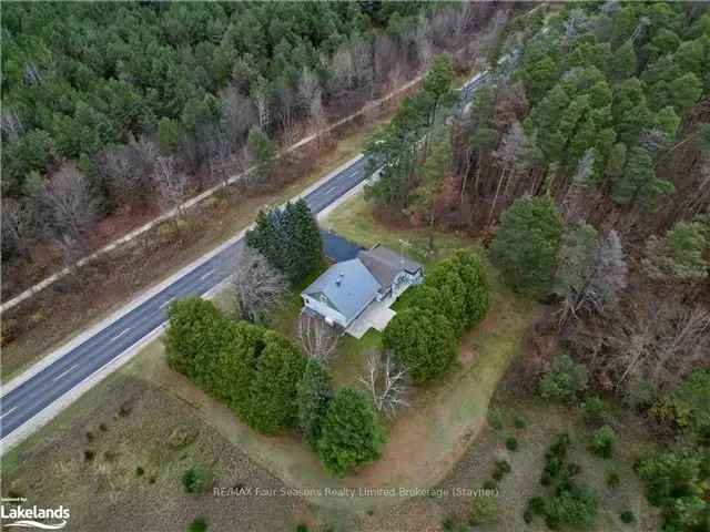 3-Bedroom Home in New Lowell with 2-Car Garage and Metal Roof